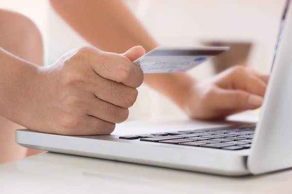 Man buying online with credit card