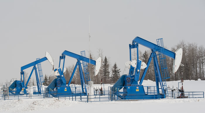 Pump jacks on a oil field in Southern Alberta