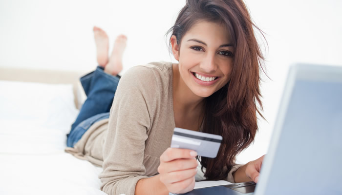 Woman Holding Credit Card