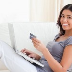 Woman Holding Credit Card